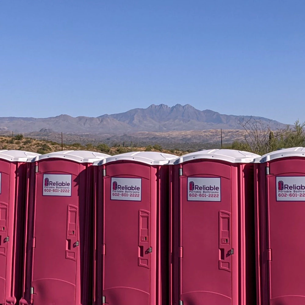 Clean and modern portable restroom unit in an outdoor setting