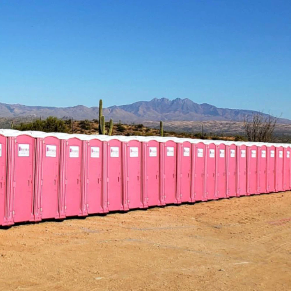 Portable bathroom unit with a clean design in an outdoor setting